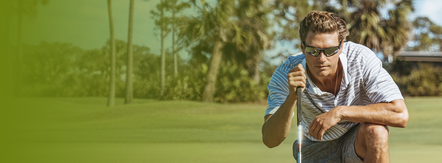 Golfer on the green wearing Abaco Polarized sunglasses